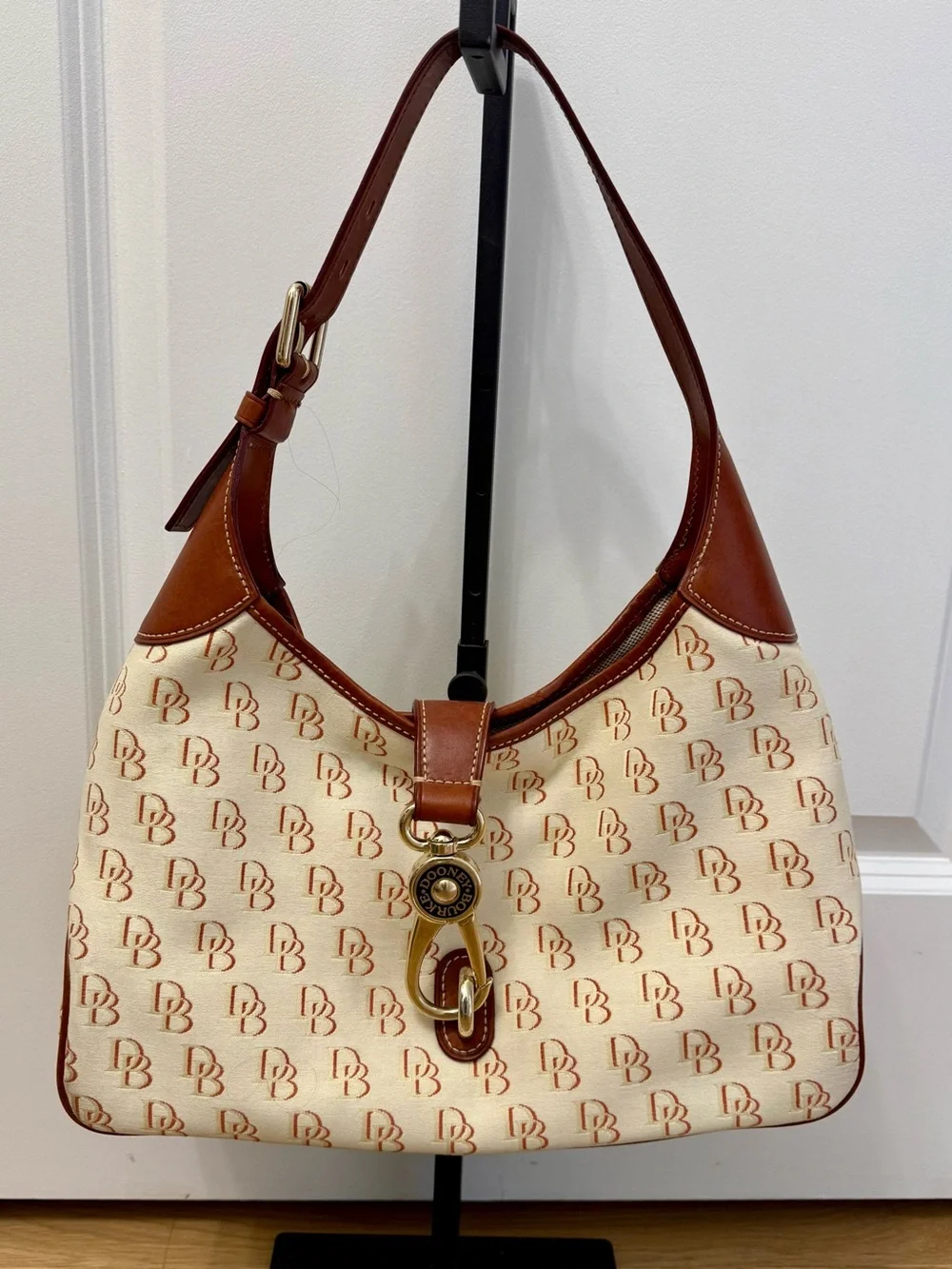 Dooney & Bourke Cream/Brown Signature Logo Lock Canvas Hobo Shoulder Bag